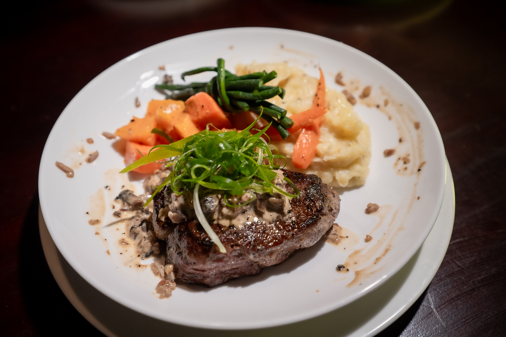 Grilled steak with fresh vegetables at Elements