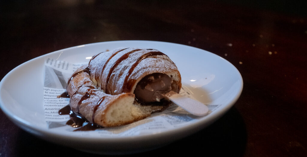Chocolate croissant drizzled with chocolate