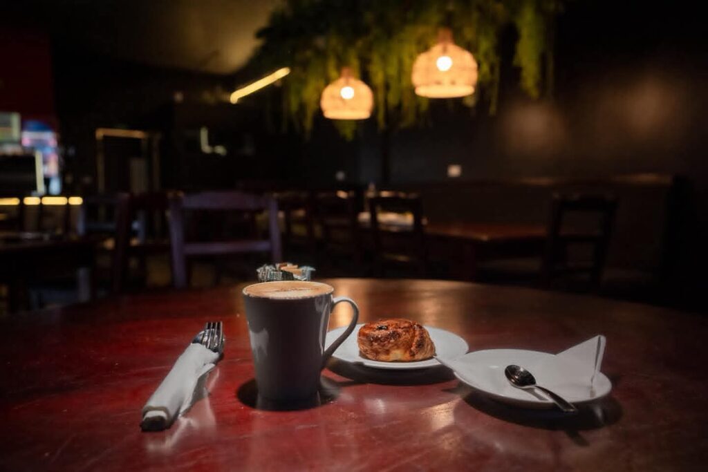 Coffee and a pastry inside Elements Restaurant & Bar